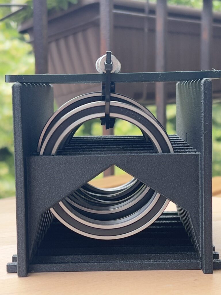 Loaded filament specimens on supports before the one-hour temperature resistance test at 65-70 °C